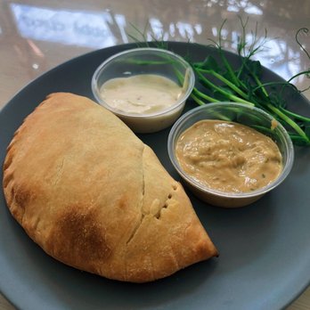 Happy Chicks Bakery - Chickpea empanada with goddess dressing. - Bakeries Near Me - Cincinnati, Ohio Happy Chicks Bakery - Chickpea empanada with goddess dressing. - Bakeries Near Me - Cincinnati, Ohio