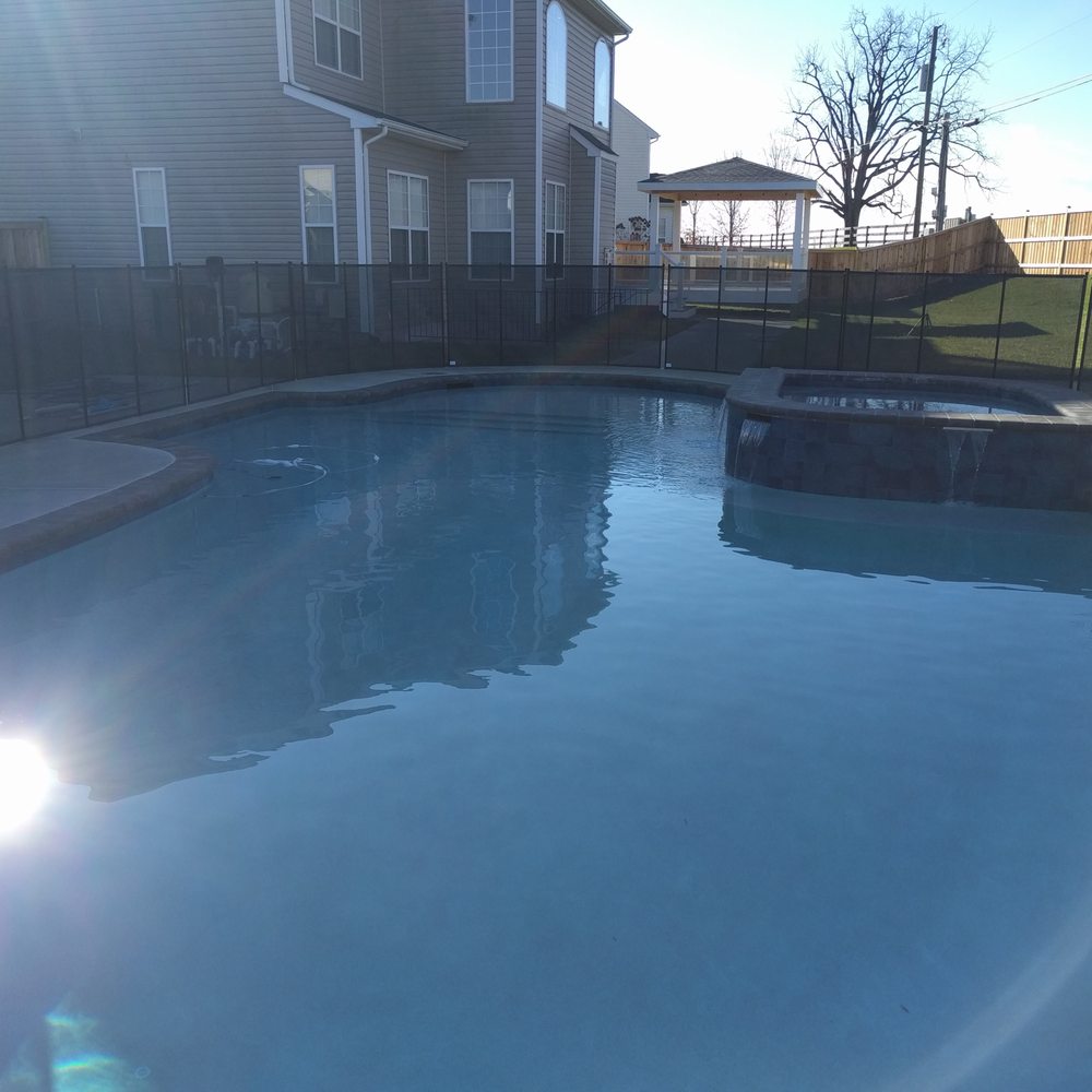 J Duggan & Associates - a pool in a backyard - Landscape Architects or Designers Near Me J Duggan & Associates - a pool in a backyard - Landscape Architects or Designers Near Me