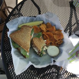 Homestyle Chicken salad on toasted sourdough with BBQ kettle chips. Also a bonus tiny cookie!