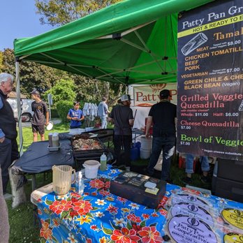 Patty Pan - people standing around a table at a farmers market - Mexican Near Me - Shoreline, Washington Patty Pan - people standing around a table at a farmers market - Mexican Near Me - Shoreline, Washington