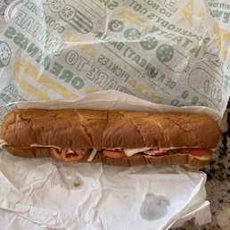 Roasted Turkey Footlong on Italian bread w/ provolone, lettuce, tomato, black olive and mayo Roasted Turkey Footlong on Italian bread w/ provolone, lettuce, tomato, black olive and mayo