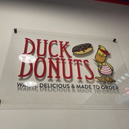 a sign for a donut shop