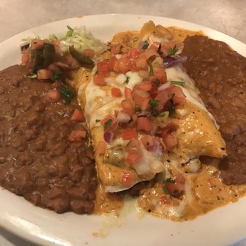 Chuy's - Fat daddy enchiladas with double refried beans - Tex-Mex Near Me - Jacksonville, Florida Chuy's - Fat daddy enchiladas with double refried beans - Tex-Mex Near Me - Jacksonville, Florida