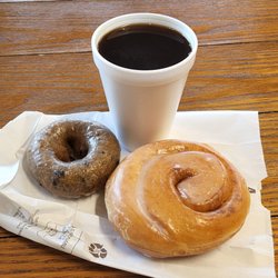 Nini's Fresh Donuts - Blueberry donut, cinnamon roll, cuppa joe breakfast.
