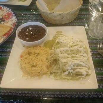 Tikal - Chicken Enchilada with Green Sauce - Mexican Near Me - Greenport, New York Tikal - Chicken Enchilada with Green Sauce - Mexican Near Me - Greenport, New York