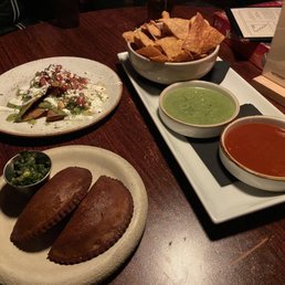 Nduja shrimp empanadas, brandade tacos, chips and salsa Nduja shrimp empanadas, brandade tacos, chips and salsa