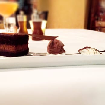 John Ash - Chocolate trio- chocolate cake, chocolate gelato and white chocolate dipped chocolate shortbread cookie. - American Near Me - Santa Rosa, California John Ash - Chocolate trio- chocolate cake, chocolate gelato and white chocolate dipped chocolate shortbread cookie. - American Near Me - Santa Rosa, California