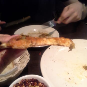 Marcello’s pizzeria - Look at how thin this is! - Pizza Near Me - Toronto, Ontario