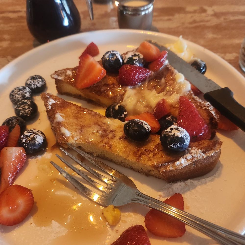 Toast Kitchen & Bar - House French Toast, half portion, without the chocolate sauce. - Breakfast & Brunch Near Me - Brea, California Toast Kitchen & Bar - House French Toast, half portion, without the chocolate sauce. - Breakfast & Brunch Near Me - Brea, California