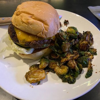 Pearl & Vine - Burger with the brussel sprouts...swapped out the fries. - New American Near Me - Katy, Texas Pearl & Vine - Burger with the brussel sprouts...swapped out the fries. - New American Near Me - Katy, Texas