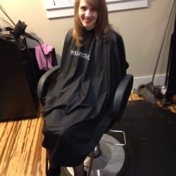 Side Tracks Full Service Salon - Charlotte has a big smile after having her first professional hair style!