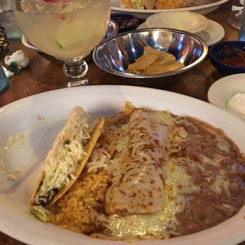 La Parrilla Mexican Restaurant - Enchilada, regular tacos rice and beans. Regular margarita. - Mexican Near Me - Acworth, Georgia