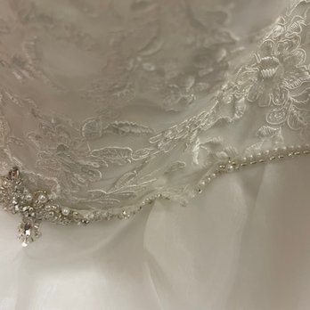 David's Bridal - They charged me a rush fee to finish my dress and didn't even finish it  I had beads falling off and buttons - Bridal Near Me - Brea, California