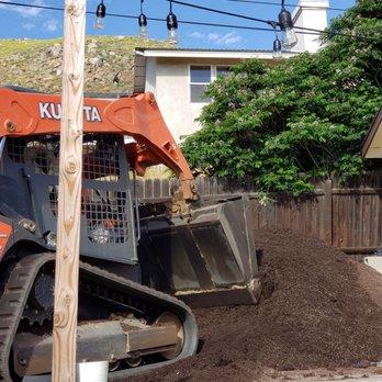 Hire My Tractor - Pushing and keeping product on tarp. - Septic Services Near Me Hire My Tractor - Pushing and keeping product on tarp. - Septic Services Near Me