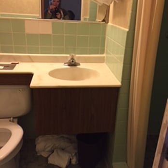 Indianhead Motel - Bath was little.  Fan was loud and on same switch as lights, so fan could only be off if light was off.  Shower stall, some rooms have tub. - Hotels Near Me - Chippewa Falls, Wisconsin