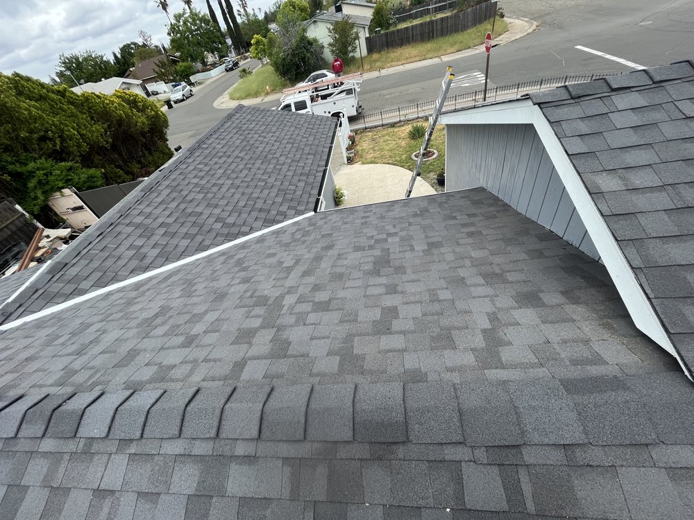 Slide of New Era Roofing