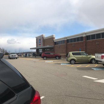 ALDI - a parking lot with cars parked in it - Grocery Near Me - Lisbon, Connecticut ALDI - a parking lot with cars parked in it - Grocery Near Me - Lisbon, Connecticut