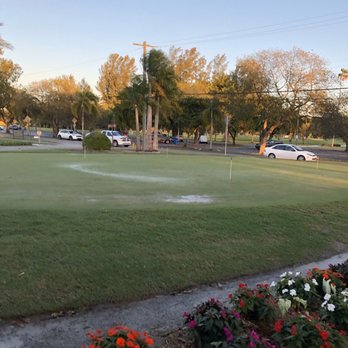 Hole 19 - Scratch Kitchen + Bar - Putting green outside restaurant - Sports Bars Near Me - Miami Springs, Florida Hole 19 - Scratch Kitchen + Bar - Putting green outside restaurant - Sports Bars Near Me - Miami Springs, Florida