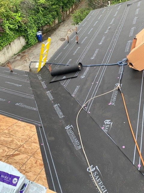 Slide of Westbay Roofing