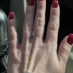 Freshly painted acrylic nails with natural look Freshly painted acrylic nails with natural look