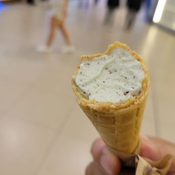 Purdys Chocolatier - a hand holding an ice cream cone - Chocolatiers & Shops Near Me - Toronto, Ontario