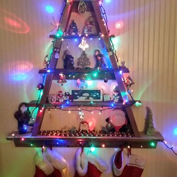 M4 Specialties - Our Xmas tree shelf, the hooks for the stocking's  are mustaches. Leave it up all year round - Outdoor Furniture Stores Near Me - Guerneville, California