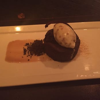 Scarpetta - Chocolate cake with salted caramel sauce and almond gelato. - Italian Near Me - Las Vegas, Nevada Scarpetta - Chocolate cake with salted caramel sauce and almond gelato. - Italian Near Me - Las Vegas, Nevada