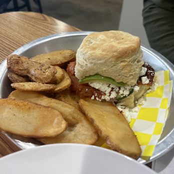 Big Bear Biscuits - YOGI biscuit sandwich: avocado, roasted tomato, cucumber, crumbled goat cheese, drizzled w/ scorpion honey served w/ homefries - $9.45 - Breakfast & Brunch Near Me - Indianapolis, Indiana