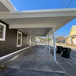 360° Painting of Central Texas - Exterior painting project: traditional brick to dramatic dark finish, transforming this multi-family property with a modern look.