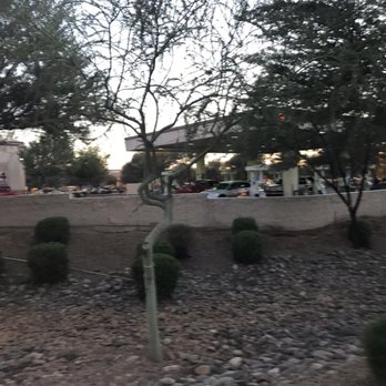 ampm - a parking meter in the middle of a street - Gas Stations Near Me - Chandler, Arizona