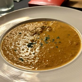 Over The Moon Cafe - Crab Bisque with tomato, tarragon and finished with white pepper. Served piping hot and so good! - New American Near Me - Tacoma, Washington Over The Moon Cafe - Crab Bisque with tomato, tarragon and finished with white pepper. Served piping hot and so good! - New American Near Me - Tacoma, Washington
