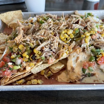 The Smoked Taco - Smoked pork nachos. These are big enough to share with someone. I couldn't finish all of mine. - Barbeque Near Me - American Fork, Utah The Smoked Taco - Smoked pork nachos. These are big enough to share with someone. I couldn't finish all of mine. - Barbeque Near Me - American Fork, Utah