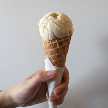 J Squared Ice Cream - a hand holding an ice cream cone - Ice Cream & Frozen Yogurt Near Me - Richmond, British Columbia