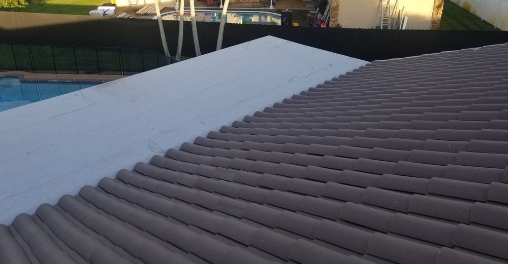 Slide of Arcon Roofing