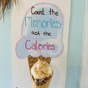 Aunt Ebby's Ice Cream - a hand holding an ice cream cone - Ice Cream & Frozen Yogurt Near Me - St. George Island, Florida Aunt Ebby's Ice Cream - a hand holding an ice cream cone - Ice Cream & Frozen Yogurt Near Me - St. George Island, Florida