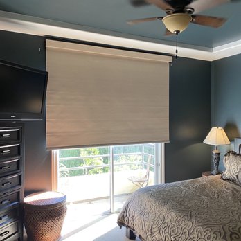 Silverstone Painting - a bedroom with a large bed and a flat screen tv - Painters Near Me - Huntington Park, California Silverstone Painting - a bedroom with a large bed and a flat screen tv - Painters Near Me - Huntington Park, California