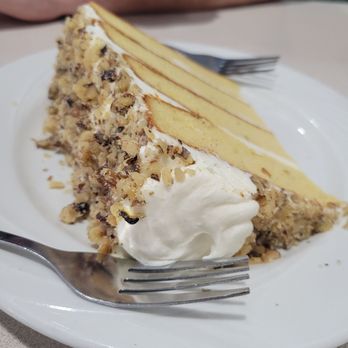 Harbor Inn Seafood Restaurant - a slice of cake on a plate - Seafood Near Me - Charlotte, North Carolina Harbor Inn Seafood Restaurant - a slice of cake on a plate - Seafood Near Me - Charlotte, North Carolina