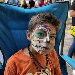 Alamo Balloon Company - This boy wanted all the colors! Dia de los Muertos at the Pearl downtown San Antonio Texas.
