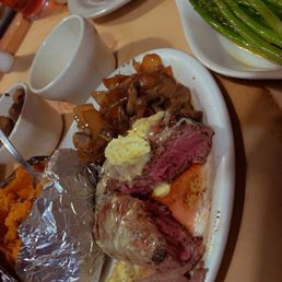 Filet, sweet potato, smothered topper for the steak, and asparagus Filet, sweet potato, smothered topper for the steak, and asparagus