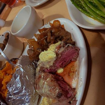 Big Mike's Steakhouse - Filet, sweet potato, smothered topper for the steak, and asparagus - Steakhouses Near Me - Orange Beach, Alabama Big Mike's Steakhouse - Filet, sweet potato, smothered topper for the steak, and asparagus - Steakhouses Near Me - Orange Beach, Alabama