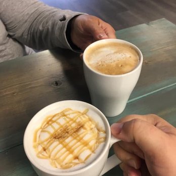 Daily Dose Cafe - Coffee with a friend. The caramel macchiato is the one in the forefront. Delish! - Cafes Near Me - Charleston, West Virginia Daily Dose Cafe - Coffee with a friend. The caramel macchiato is the one in the forefront. Delish! - Cafes Near Me - Charleston, West Virginia