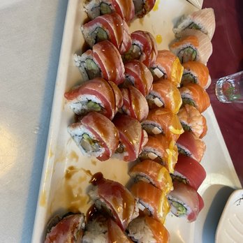 Mizu - Seared tuna roll left (delicious), Salmon House Roll middle, rainbow roll right - Sushi Bars Near Me - San Diego, California Mizu - Seared tuna roll left (delicious), Salmon House Roll middle, rainbow roll right - Sushi Bars Near Me - San Diego, California