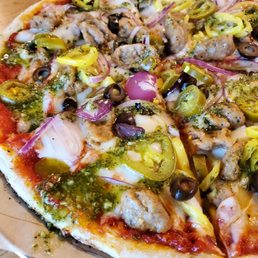 Hot link with pesto drizzle