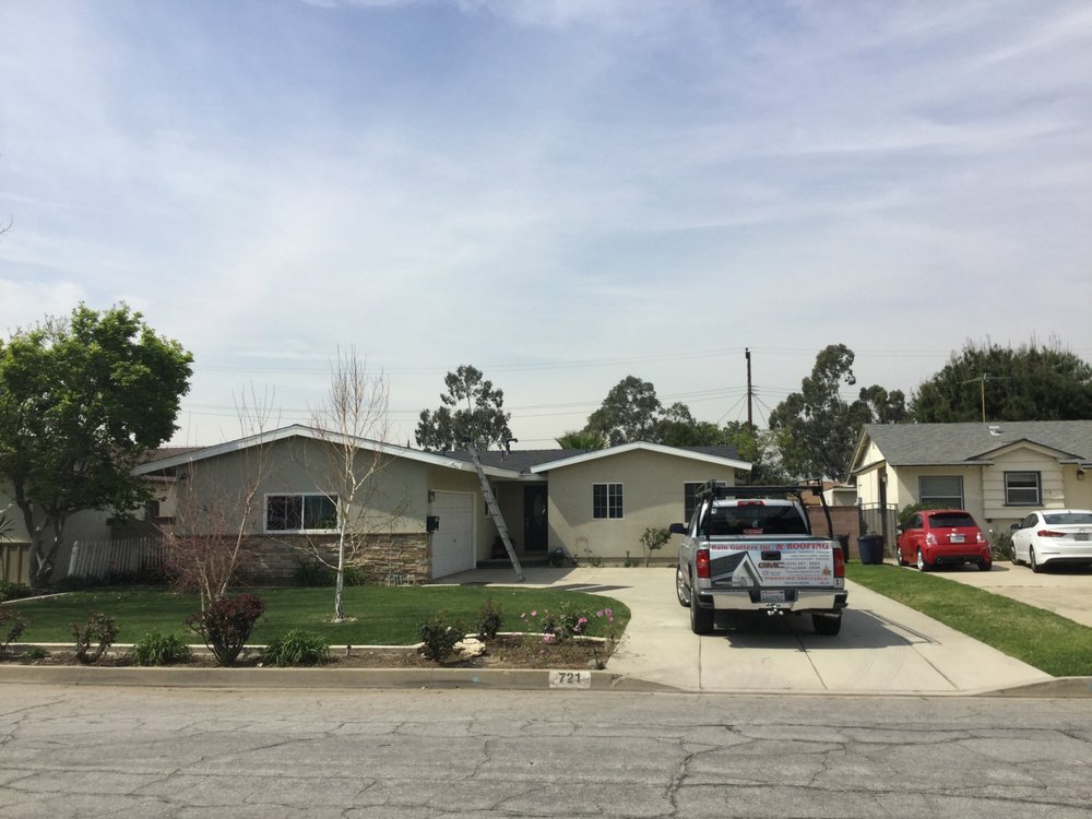 Slide of MA Roofing and Gutters