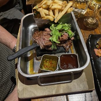 Surfish Bistro - Trying to keep the steak from overcooking didn't work. Oily Chimichurri sauce - Latin American Near Me - Brooklyn, New York