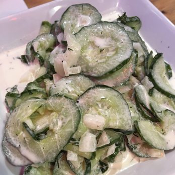 Max Bratwurst und Bier - Cucumber Salad - cucumbers, dill, and onions in a creamy dressing. - German Near Me - Astoria, New York Max Bratwurst und Bier - Cucumber Salad - cucumbers, dill, and onions in a creamy dressing. - German Near Me - Astoria, New York