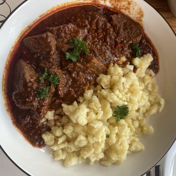 hoppla - Beef goulash and spaetzle. - Hungarian Near Me - Interlaken, BE hoppla - Beef goulash and spaetzle. - Hungarian Near Me - Interlaken, BE