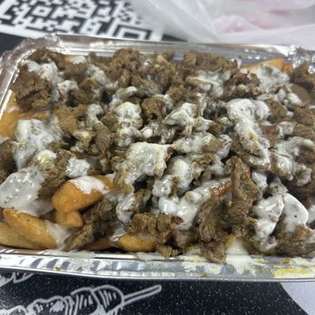 Fire Up Halal Grill - Lamb Shawarma over fries - Halal Near Me - Temple Ter, Florida Fire Up Halal Grill - Lamb Shawarma over fries - Halal Near Me - Temple Ter, Florida