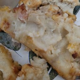 Raw dough. Totally undercooked. Gross that's a small piece that's not even a large piece. The dough is so undercooked.I had to spit it out Raw dough. Totally undercooked. Gross that's a small piece that's not even a large piece. The dough is so undercooked.I had to spit it out