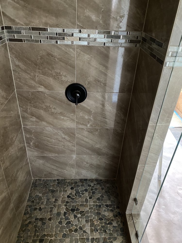 Slide of Adrian’s Complete Remodeling & Roofing